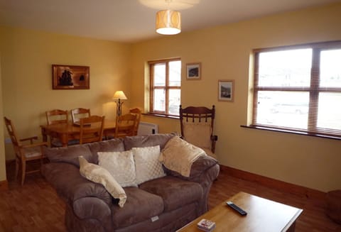 Fairfield Holiday Home, Dingle Co Kerry. Open plan living room, comfortable couch.