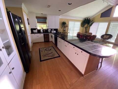 Kitchen features microwave, dishwasher and all the utensils you will need.