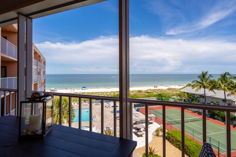 Balcony View 4th floor- pool-jacuzzi-tennis courts-beach- Unit 406 