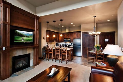 Relaxed living and dining areas with fully-outfitted kitchen