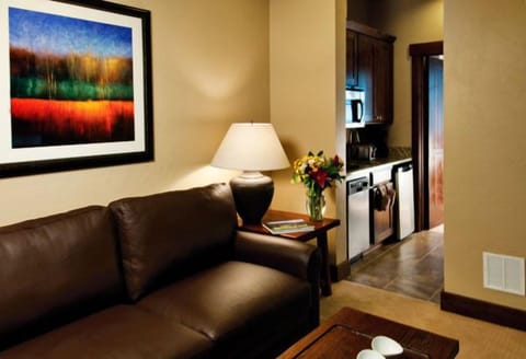 Separate suite sitting room and mini-kitchen offers lock-off privacy.