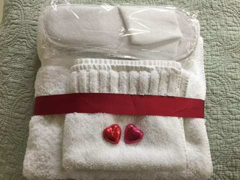 Freshly laundered towels, robes and spa slippers are ready to welcome all guests