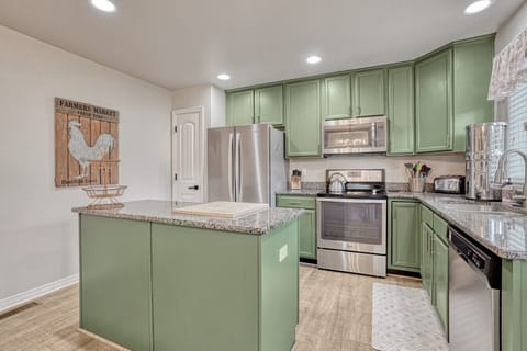 Kitchen with microwave, oven, and dishwasher
