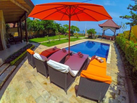 Absolutely beachfront and private: pool, garden and everything else just for you