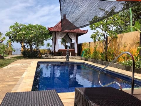 No need for suntan lotion with the pool shade, can be put up on request.