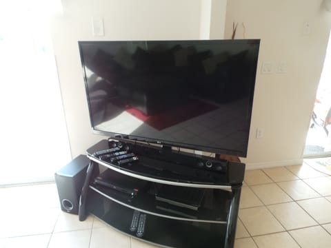 Extra Large TV in Lounge with Surround Sound HD Cable and Blu Ray 