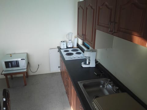 Fridge, microwave, coffee/tea maker, toaster