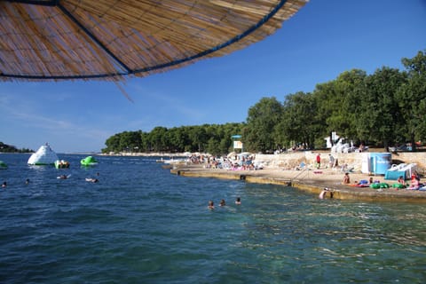 Beach nearby, sun loungers