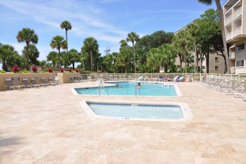Newly Resurfaced pool w/cool travertine & comfy chairs right outside condo Patio