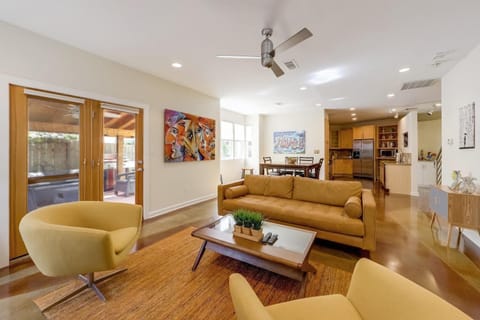 The open concept living area, dining room, and kitchen is perfect for your group's next getaway!