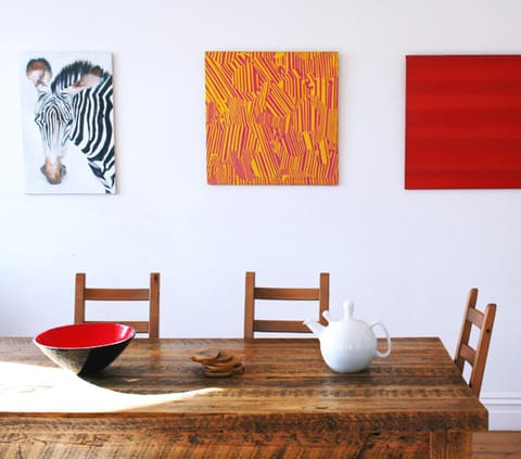 in-housec gallery and ten seater rustic table