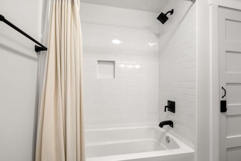 Combined shower/tub, hair dryer, towels, soap