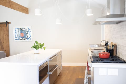 Everything you need to cook. Fridge is tucked away in the drawers