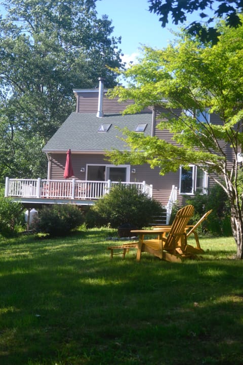 Set back from the street,  enjoy the spacious deck that overlooks front yard.
