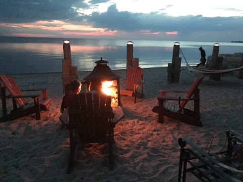 On the beach, sun loungers, beach towels