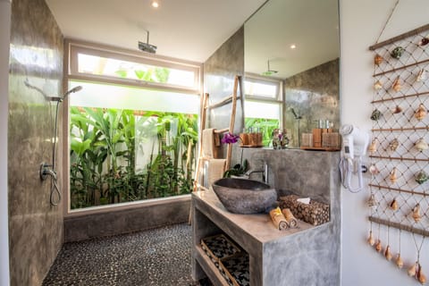 Shower, eco-friendly toiletries, hair dryer, towels