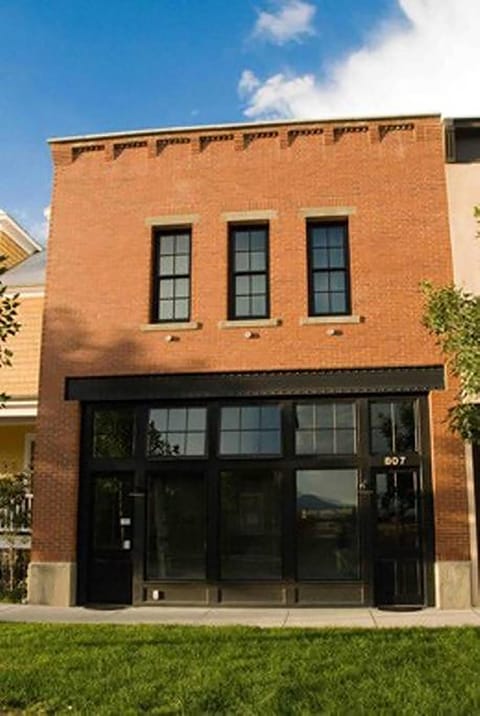 Inspired by Brooklyn brownstones, you stay on the 2nd story of Firehouse Flat.