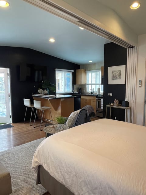 Full tub with overhead shower