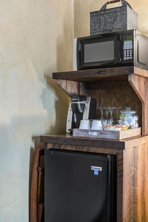 The Rustic Suite has a mini-frig, a microwave, and Keurig with plenty of dark roast, medium roast and decaf. Need more? Just let us know!