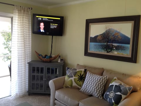 Entertainment center with painting of Mountain Island