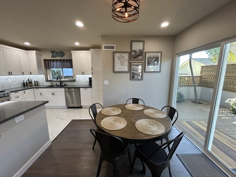 Dining room opens to deck and kitchen.