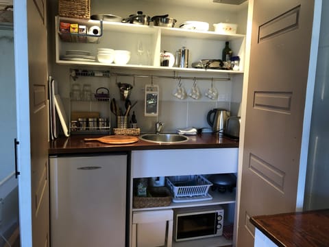 Fridge, microwave, coffee/tea maker, electric kettle