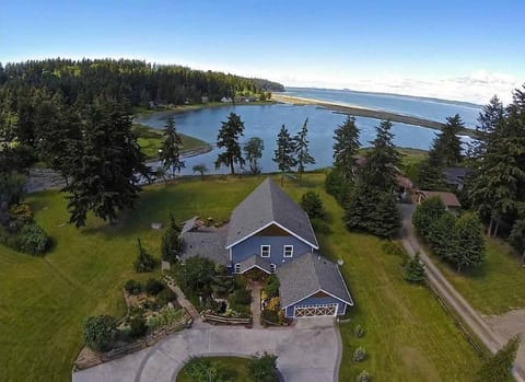 Situated on 2.5 private acres on Race Lagoon looking N to Saratoga Passage.  