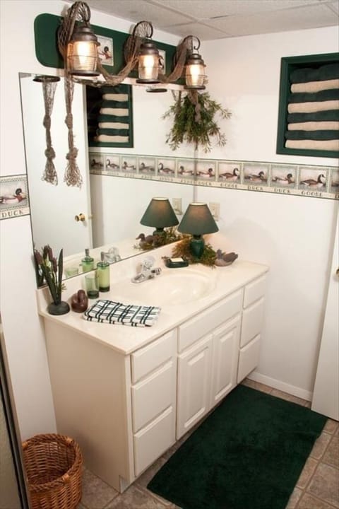 Combined shower/tub, hair dryer, towels, soap