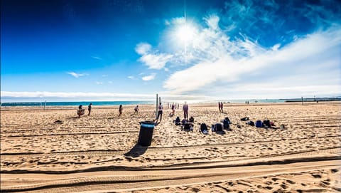 On the beach, sun loungers, beach towels