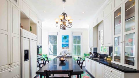 The kitchen bar seating is perfect for a quick bite or keeping the cooks company...