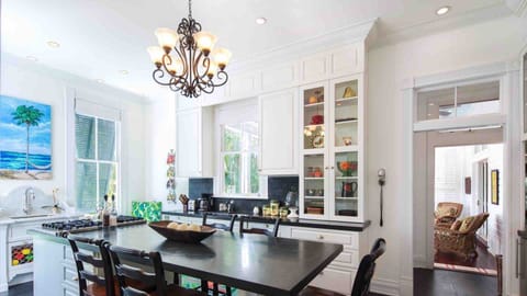 The fully equipped kitchen has premium appliances and all of the tools needed to prepare a meal at home...