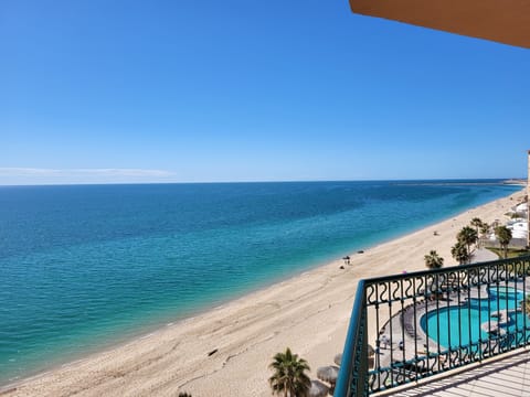 On the beach, sun loungers, beach towels