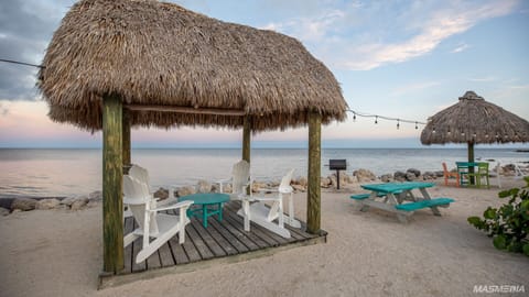 On the beach, sun loungers