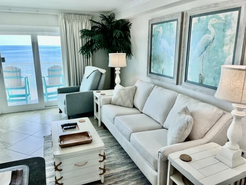 Living Area With Balcony Access Overlooking Gulf