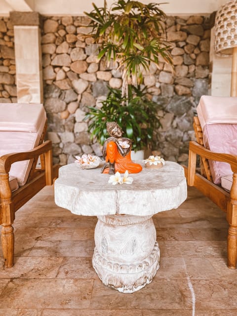 relaxing area in the shade next to the pool