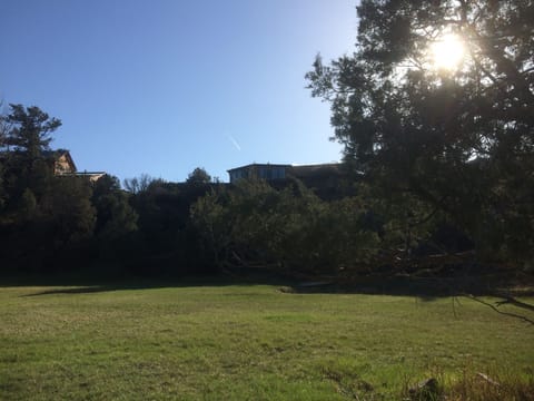 Looking up at house from the lower property.
