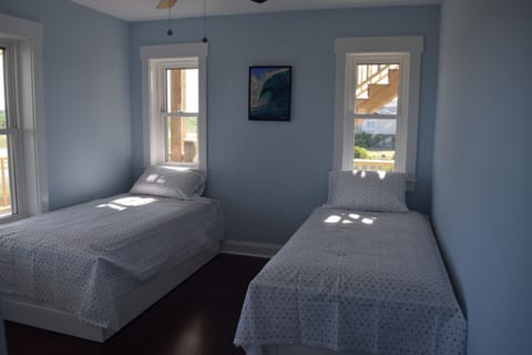 Bedroom 5, two twin beds with marsh view (blinds and nightstand have been addes)