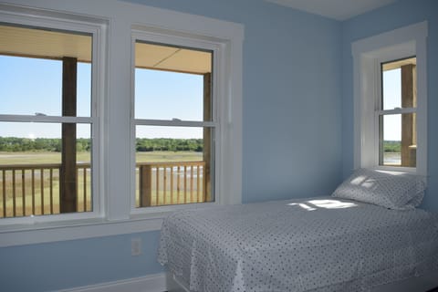 Bedroom 5, two twin beds with marsh view (blinds have been added)