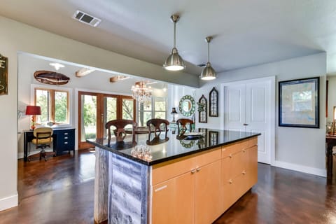French doors overlook the large waterfront backyard.