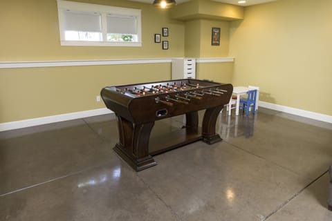 Lower level Bonus/TV  Room with Foosball Table and Kids Play area 