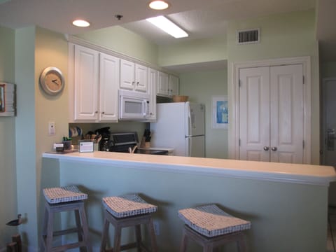 Your kitchen. Sit at the bar and watch your chef cook.