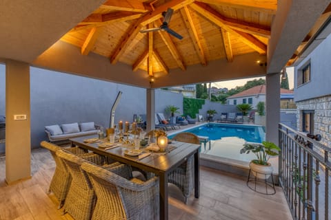 Outdoor pool, a heated pool, sun loungers