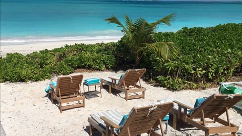 On the beach, sun loungers, beach towels