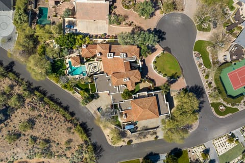 Highlighting its design and features from a captivating perspective, this view offers a comprehensive look at the property.