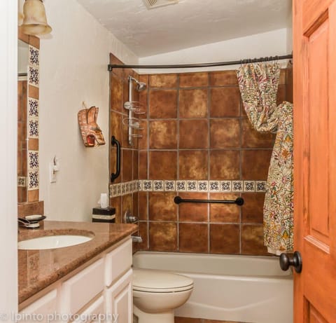 Combined shower/tub, hair dryer, towels, toilet paper