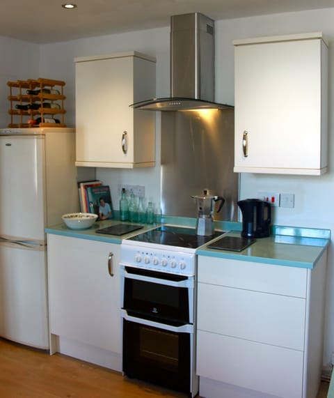 For the chef: cookery books and plenty of utensils and equipment.