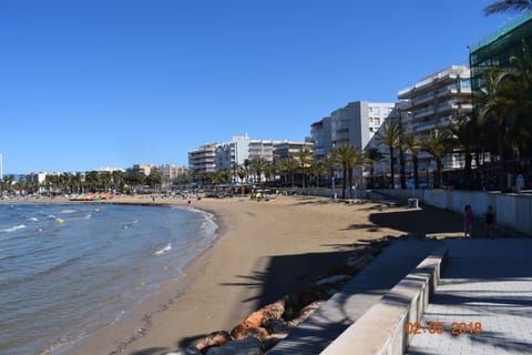 On the beach, beach towels