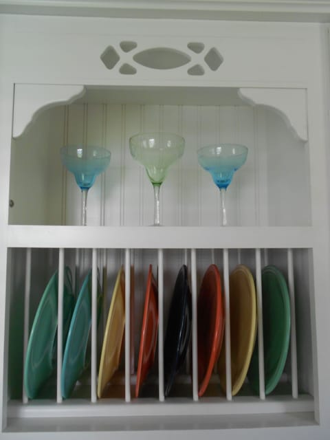 Fiestaware and Margarita glasses in this fully equipped kitchen.