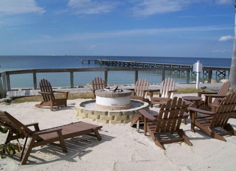 Beachside firepit and fishing pier on site