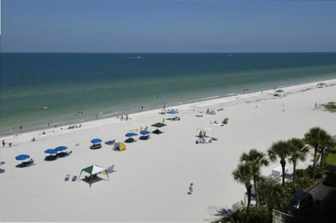 On the beach, sun loungers, beach umbrellas, beach towels